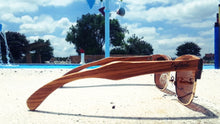Load image into Gallery viewer, zebrawood sunglasses with brown lens by pool