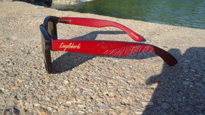 red bamboo sunglasses outdoors