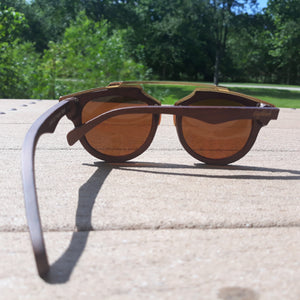 cherry wood and acetate sunglasses outdoors