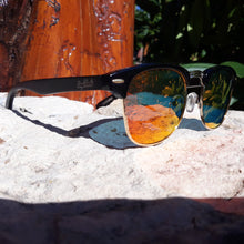 Load image into Gallery viewer, fire at night sunglasses quarter view in the sun