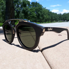 Load image into Gallery viewer, black wood with silver metal frame sunglasses outdoors