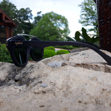 Load image into Gallery viewer, black wood with silver metal frame sunglasses side view outdoors