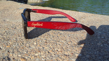Load image into Gallery viewer, red bamboo sunglasses outdoors