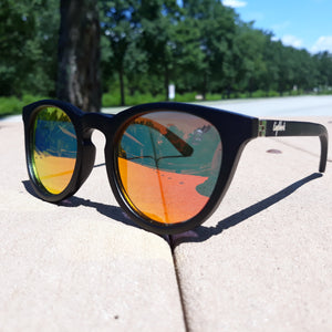 outdoors view of red lens sunglasses