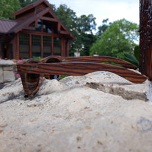 Load image into Gallery viewer, zebrawood full frame sunglasses side view on rock